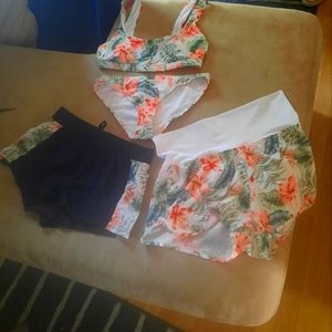 Beautiful and Bright summer bikini with 2 Pairs of matching shorts.